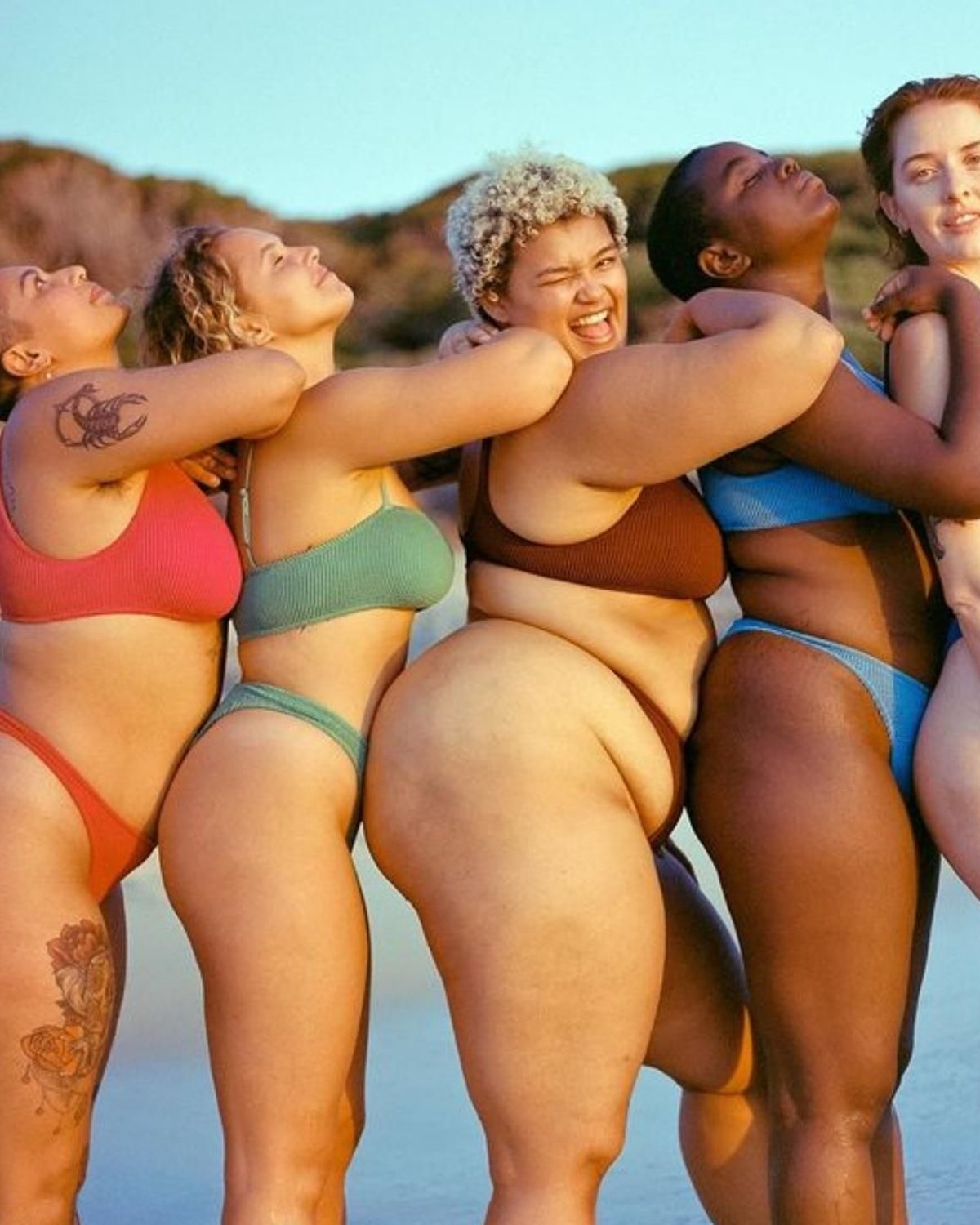 Photo of 5 women in bikini on the beach