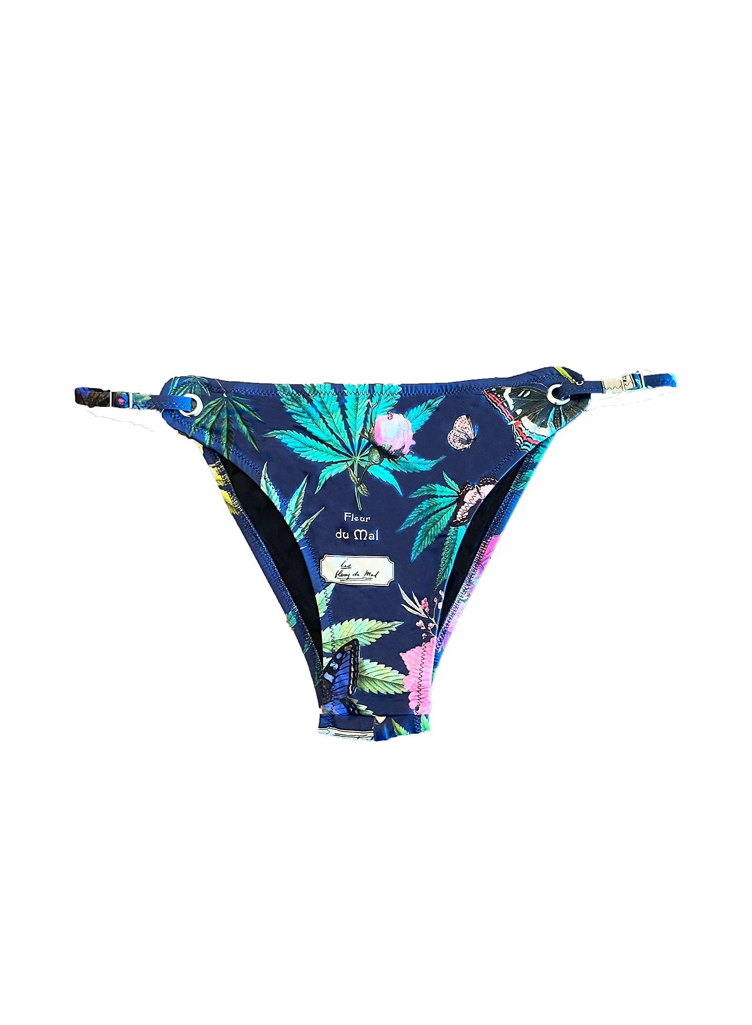 Fleur du Mal Botanical Grommet Bikini Bottom, a navy cheeky bottom with leaf and butterfly print and grommet side straps