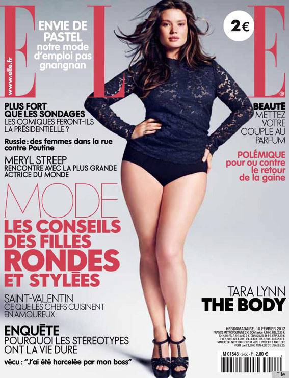 Tara Lynn on the cover of Elle France, February 2012, in a navy lace top and black briefs, under the line "The Body"