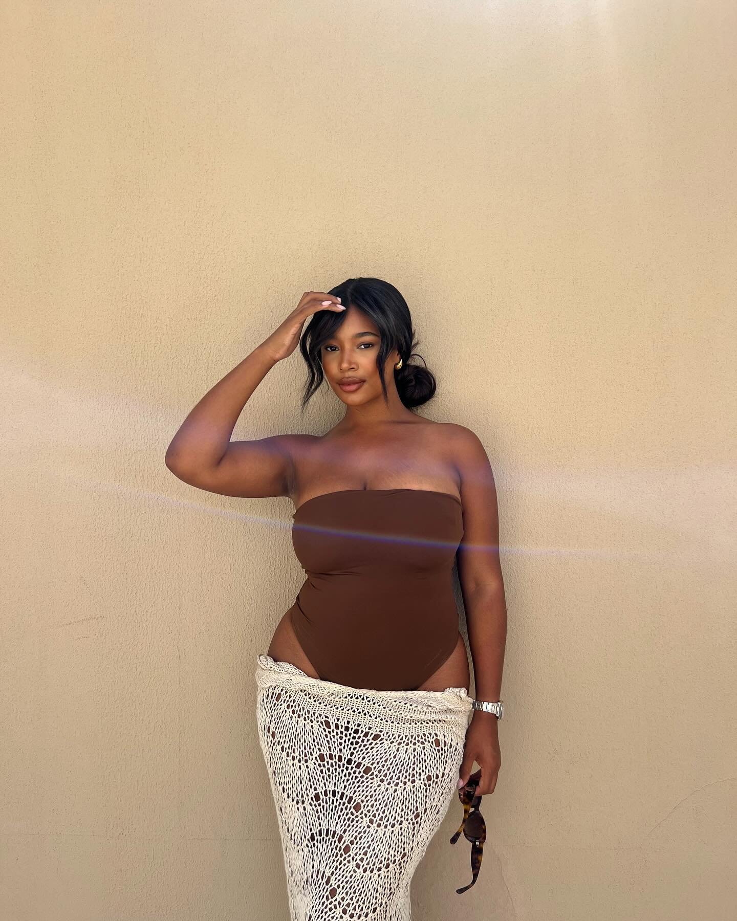 @alessatyrrellcha wearing Bishop strapless swimsuit by Norma Kamali