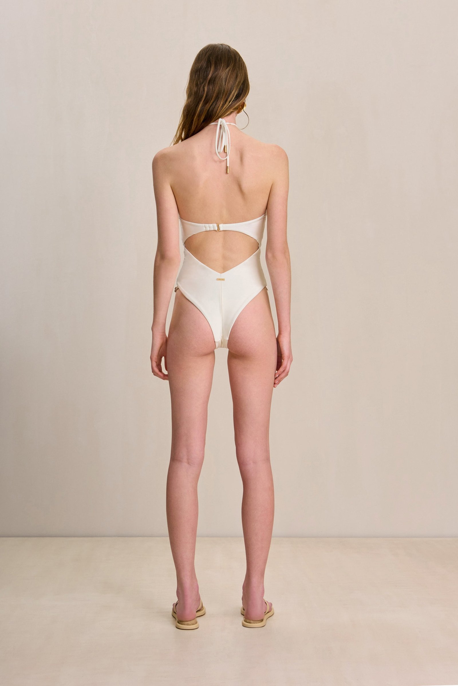 ASTER ONE PIECE - OFF WHITE