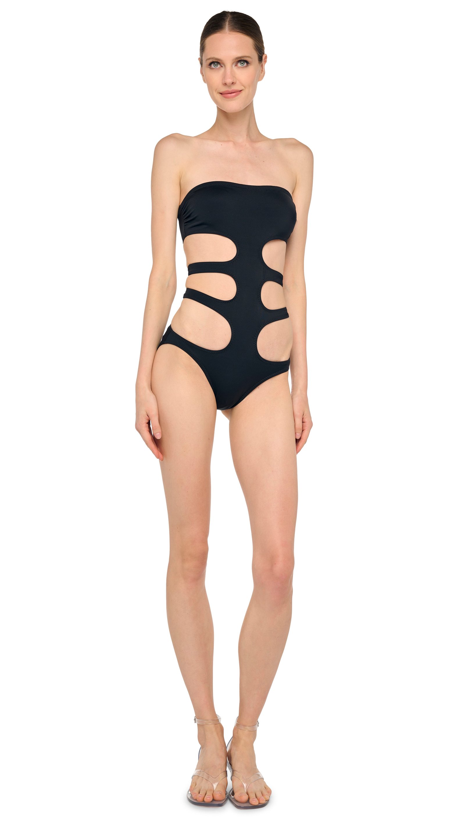 Norma Kamali Triple E Mio in black, strapless one-piece with side cutouts, studio front