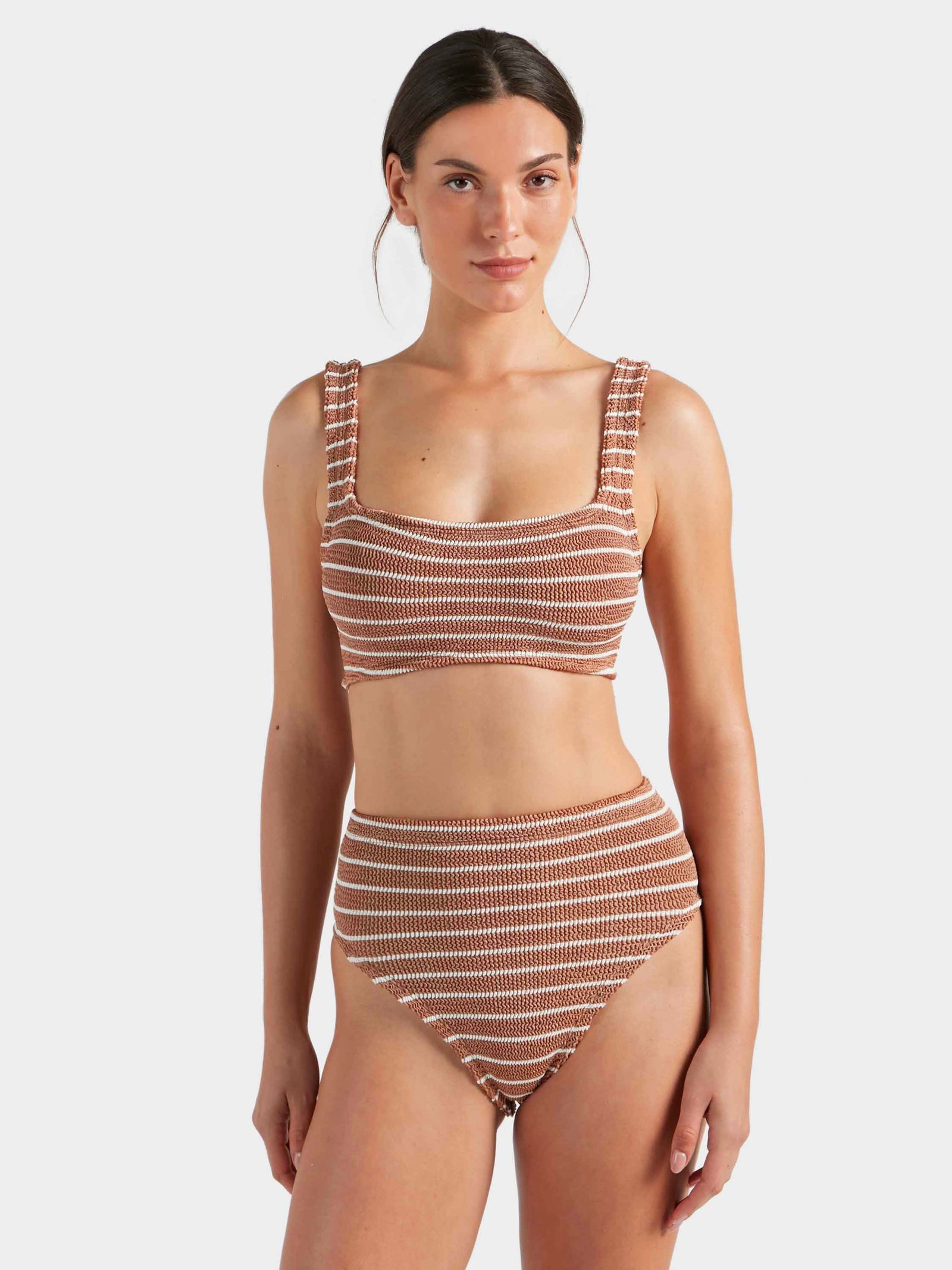 Model in the Patricia bikini by Hunza G in metallic cocoa and white stripe crinkle, front view