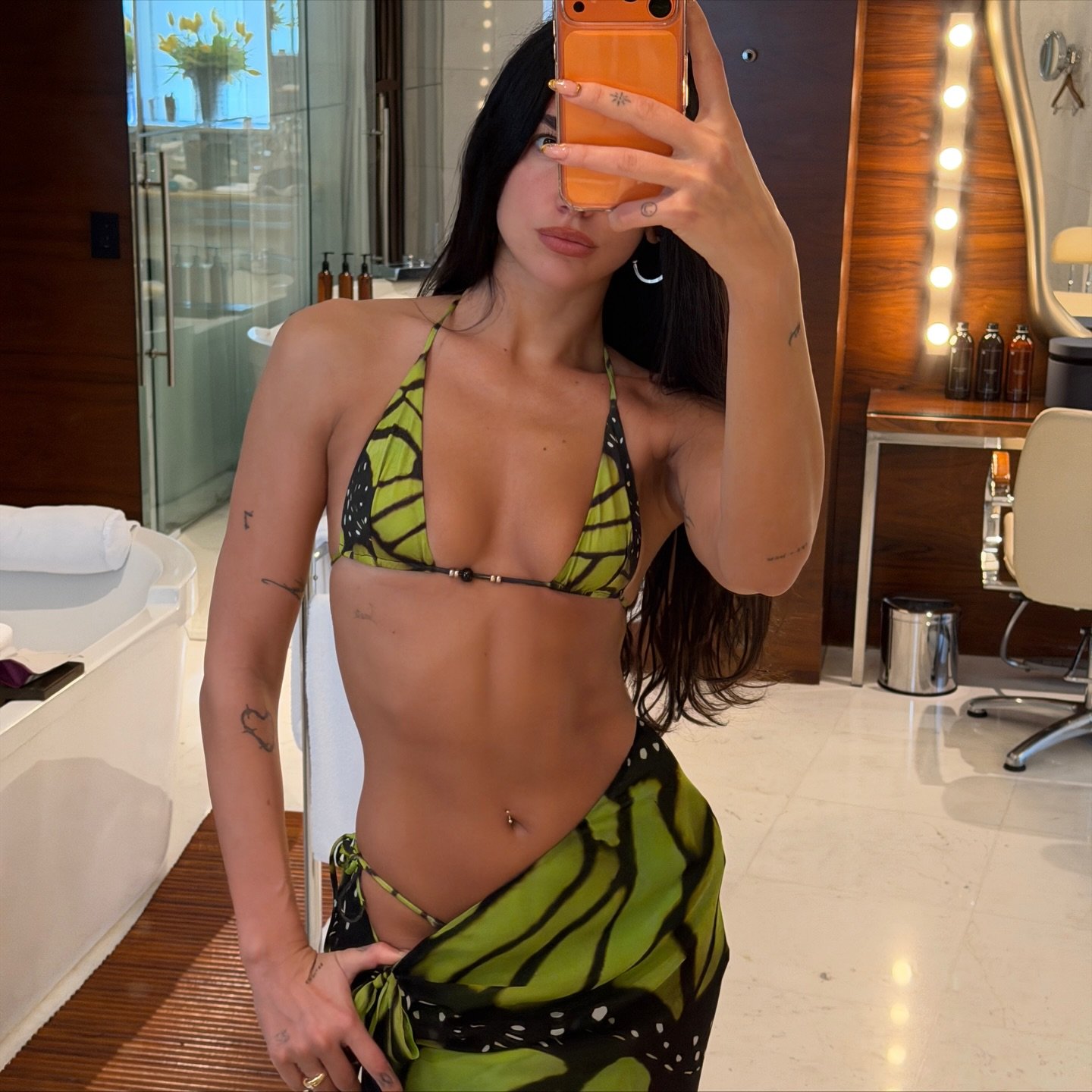 Dua Lipa wearing the Brasilia Bikini and Sarong from Rat & Boa